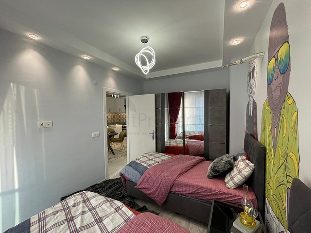 Трехкомнатная квартира в районе Махмутлар