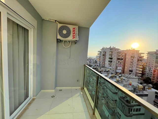 Трехкомнатная квартира в районе Махмутлар