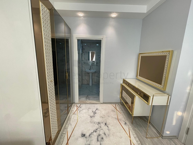 Трехкомнатная квартира в районе Махмутлар