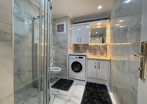 Трехкомнатная квартира в районе Махмутлар