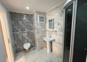 Трехкомнатная квартира в районе Махмутлар