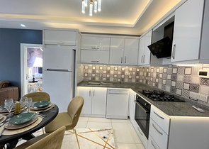 Трехкомнатная квартира в районе Махмутлар