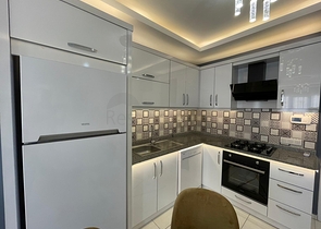 Трехкомнатная квартира в районе Махмутлар