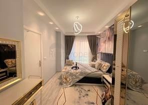 Трехкомнатная квартира в районе Махмутлар