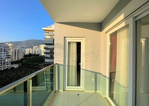 Трехкомнатная квартира в районе Махмутлар