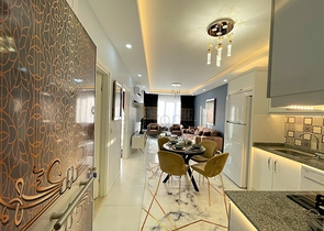 Трехкомнатная квартира в районе Махмутлар