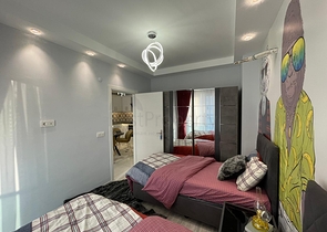 Трехкомнатная квартира в районе Махмутлар