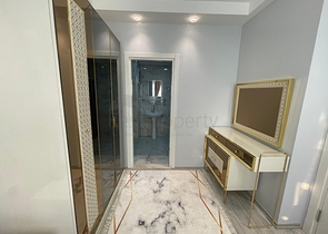 Трехкомнатная квартира в районе Махмутлар