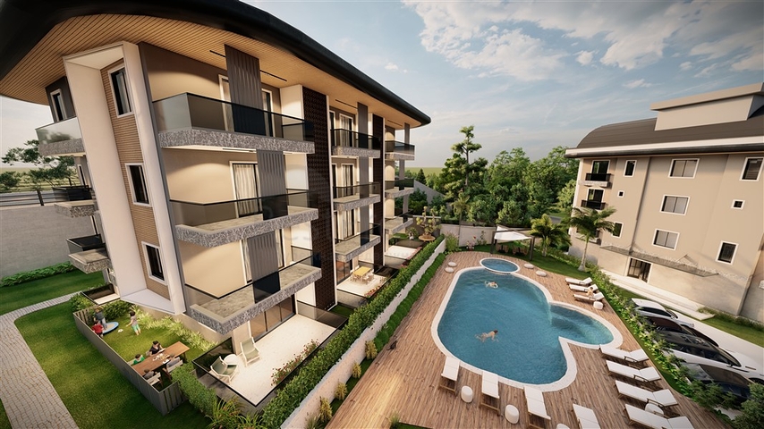 Садовые дуплексы и пентхаусы в новом проекте в самом центре Алании