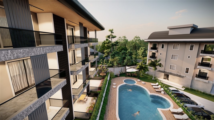 Садовые дуплексы и пентхаусы в новом проекте в самом центре Алании