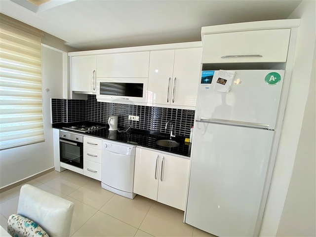 Меблированная квартира планировкой 1+1 в районе Махмутлар