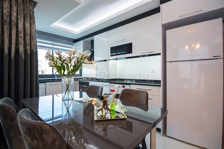 Меблированная квартира планировки 2+1 в районе Махмутлар