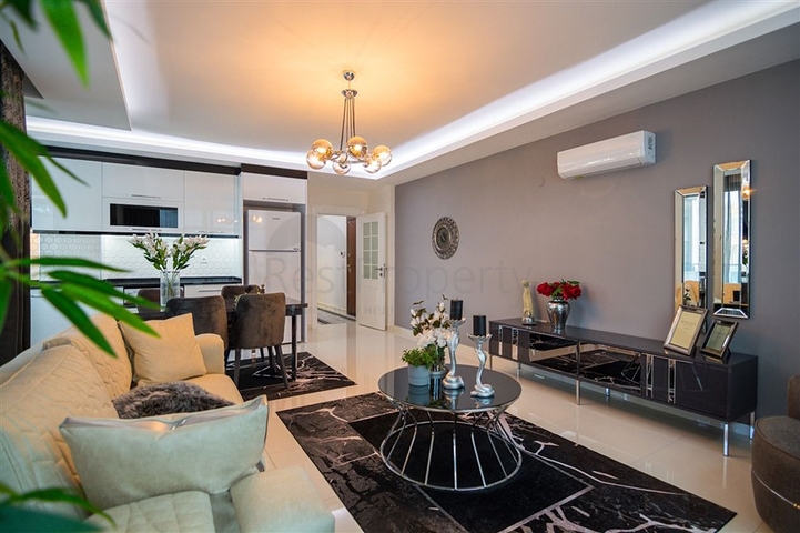 Меблированная квартира планировки 2+1 в районе Махмутлар