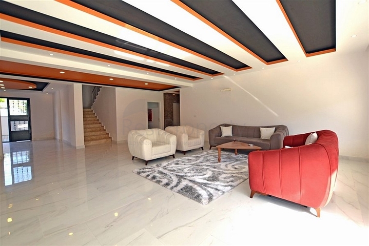 Трехкомнатная квартира в районе Махмутлар