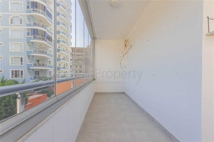 Трехкомнатная квартира в районе Махмутлар