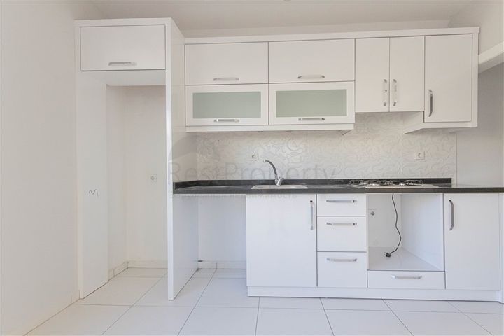 Трехкомнатная квартира в районе Махмутлар