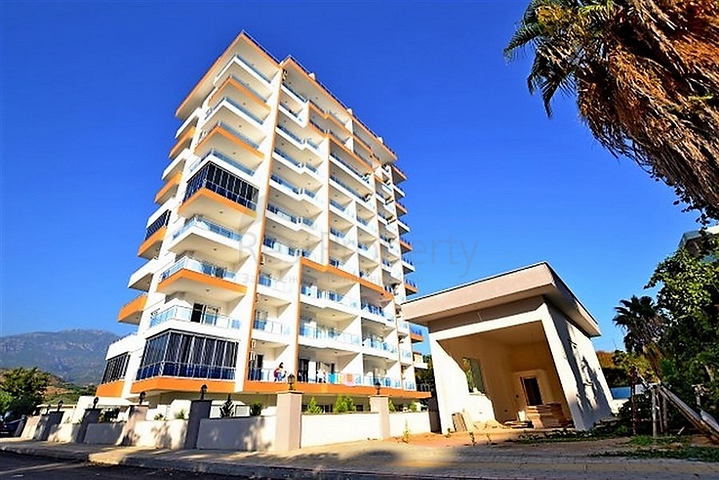 Трехкомнатная квартира в районе Махмутлар