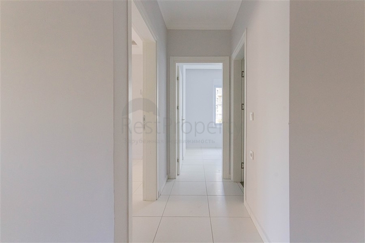 Трехкомнатная квартира в районе Махмутлар