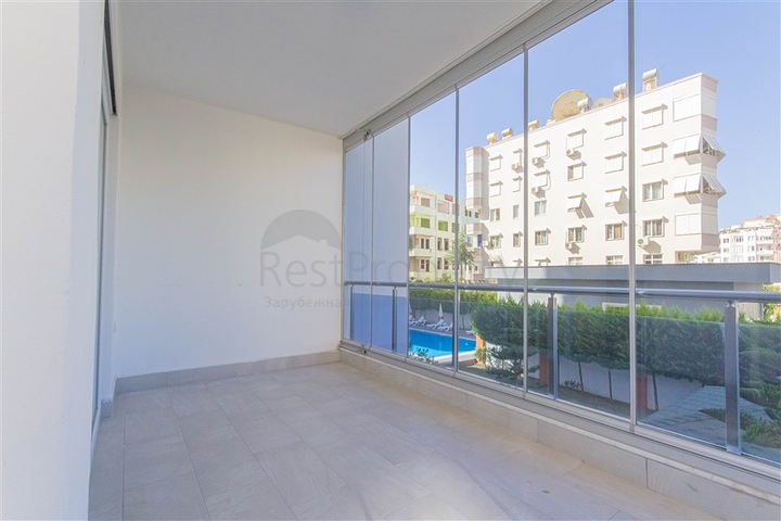 Трехкомнатная квартира в районе Махмутлар