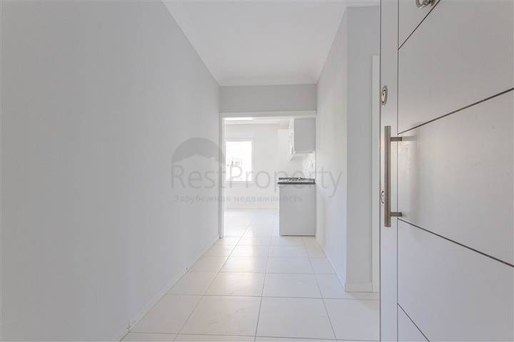 Трехкомнатная квартира в районе Махмутлар