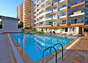 Трехкомнатная квартира в районе Махмутлар