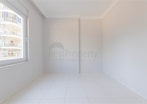 Трехкомнатная квартира в районе Махмутлар