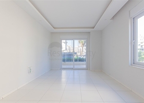 Трехкомнатная квартира в районе Махмутлар