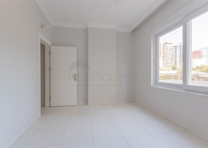 Трехкомнатная квартира в районе Махмутлар