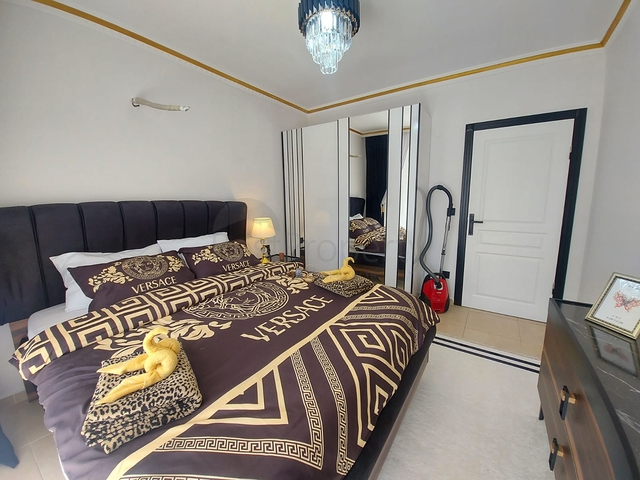 Трехкомнатная квартира в районе Махмутлар планировкой 2+1