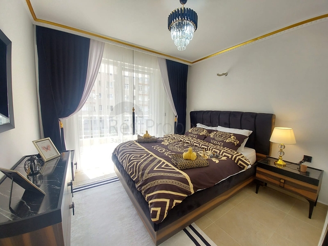 Трехкомнатная квартира в районе Махмутлар планировкой 2+1