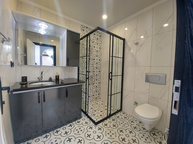 Трехкомнатная квартира в районе Махмутлар планировкой 2+1