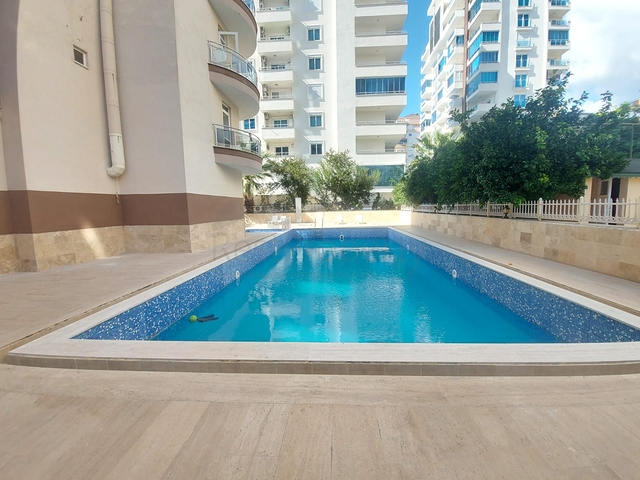 Трехкомнатная квартира в районе Махмутлар планировкой 2+1