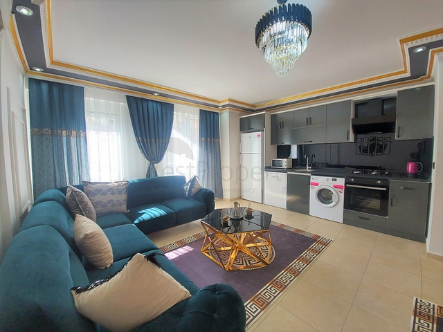 Трехкомнатная квартира в районе Махмутлар планировкой 2+1