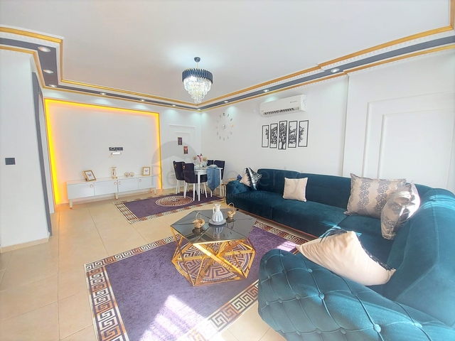 Трехкомнатная квартира в районе Махмутлар планировкой 2+1