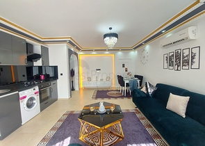 Трехкомнатная квартира в районе Махмутлар планировкой 2+1