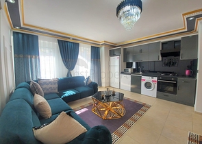 Трехкомнатная квартира в районе Махмутлар планировкой 2+1