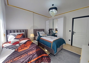 Трехкомнатная квартира в районе Махмутлар планировкой 2+1