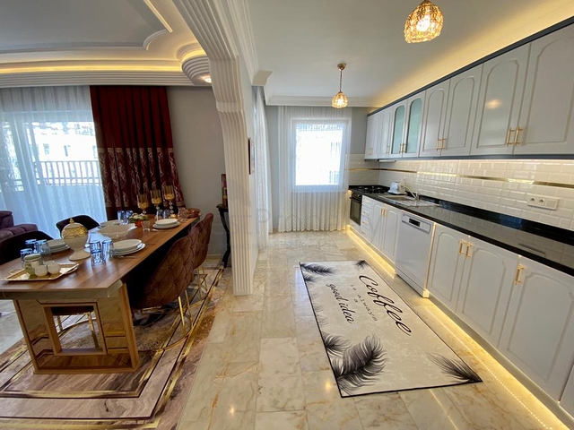 Меблированная квартира планировки 2+1 в районе Махмутлар