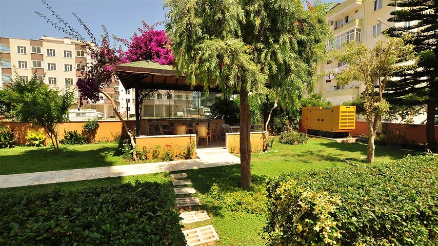 Меблированная квартира планировки 2+1 в районе Махмутлар