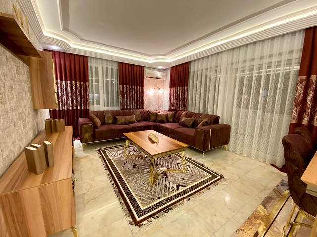 Меблированная квартира планировки 2+1 в районе Махмутлар