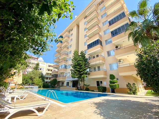 Меблированная квартира планировки 2+1 в районе Махмутлар