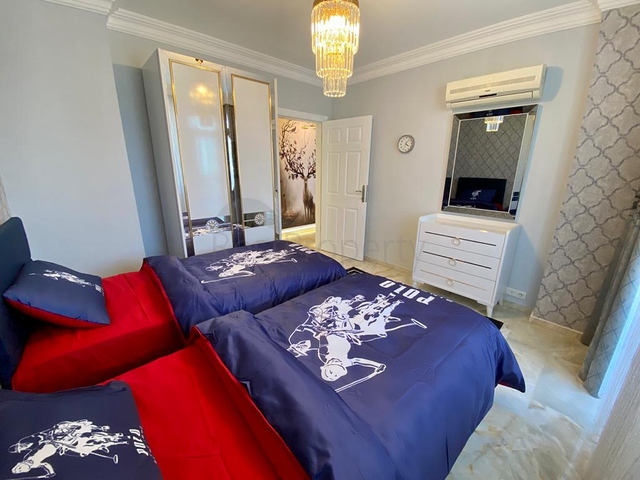 Меблированная квартира планировки 2+1 в районе Махмутлар