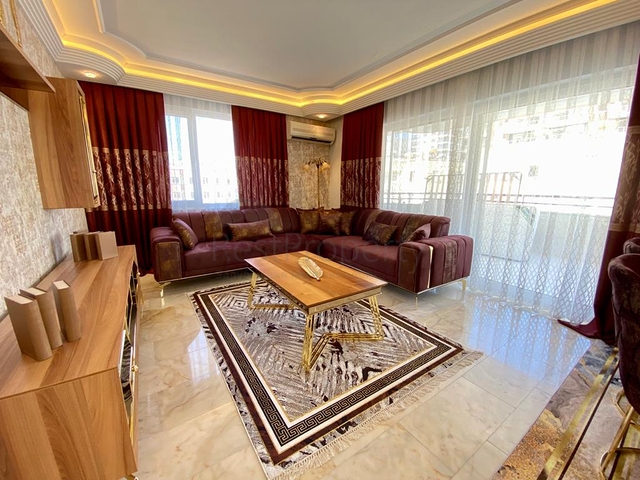 Меблированная квартира планировки 2+1 в районе Махмутлар