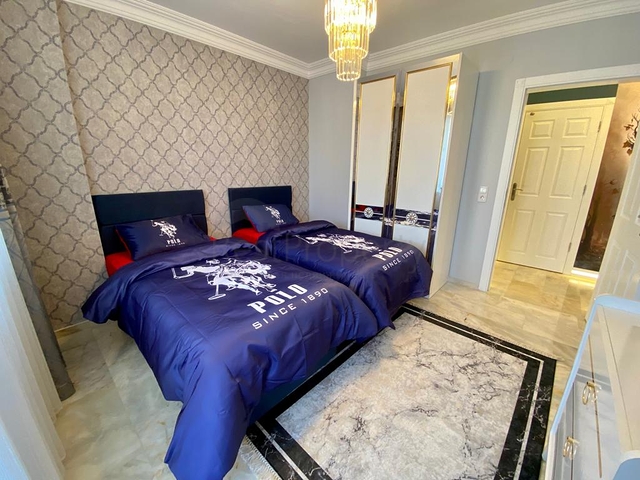 Меблированная квартира планировки 2+1 в районе Махмутлар