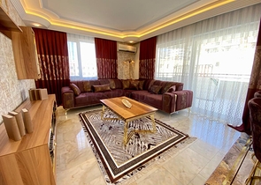 Меблированная квартира планировки 2+1 в районе Махмутлар