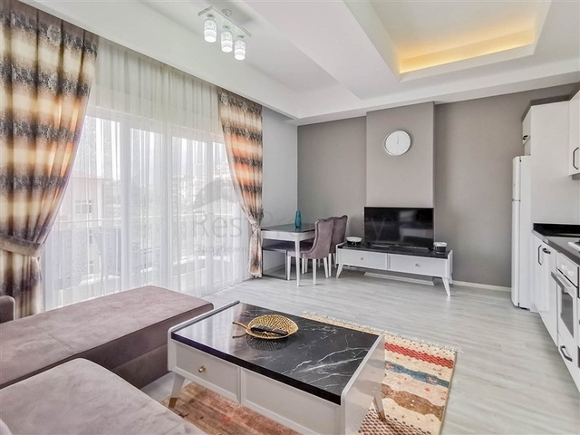 Меблированная квартира планировки 1+1 в 15 минутах от моря