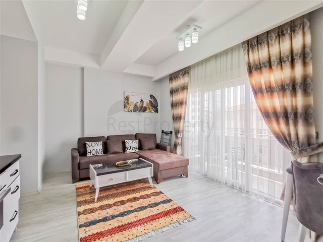 Меблированная квартира планировки 1+1 в 15 минутах от моря