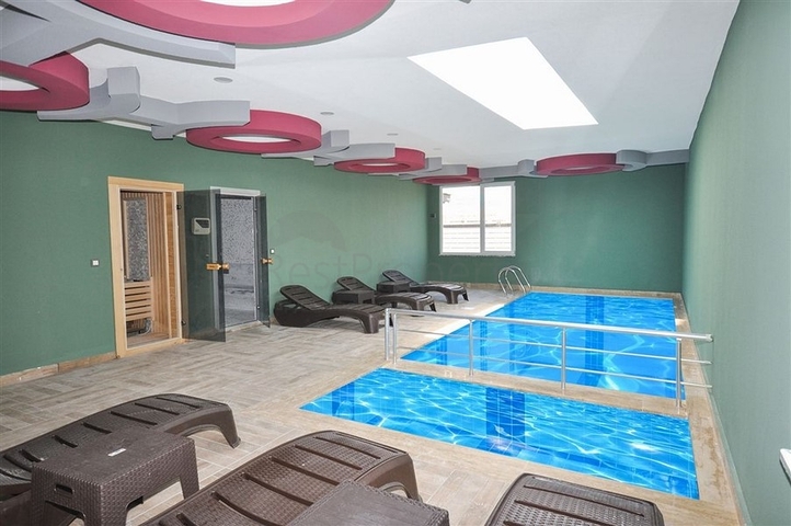 Меблированная квартира планировки 1+1 в 15 минутах от моря