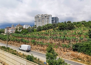 Меблированная квартира планировки 1+1 в 15 минутах от моря