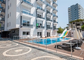 Меблированная квартира планировки 1+1 в 15 минутах от моря